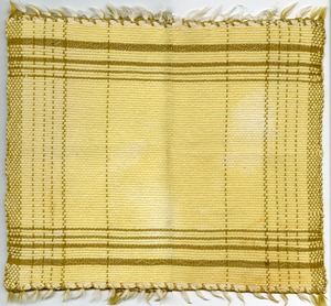 Handloom yellow and tan placemat, Buckland, Mass., circa 1950
