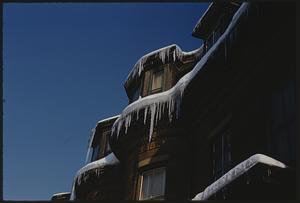 View of icicles hanging from multiple stories of building, Boston
