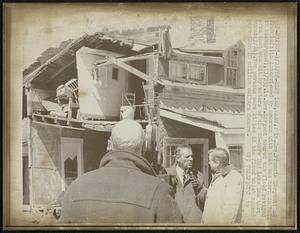 East Lee, Mass.: Lt. Gov. Francis Sargent (2nd from left) is interviewed by newsman with that was torn in half in background), (3/25). Lt. Gov. Sargent toured the flood ravaged area that was hit by waters of the 20-acre Mud Lake Dam that burst (3/24). Two persons were killed in the flood which caused more than 10 million dollars damage.