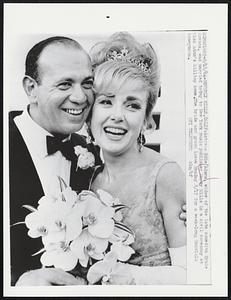 Actress Edie Adams, widow of the late comedian Ernie Kovacs, was married today to New York music publisher Marty Mills in a civil seremony at Miss Adam's hilltop home. The bride and groom leave Monday 8/17 for a week-long Honolulu honeymoon.
