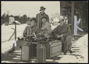 Benno Rybizka (seated center) and Franz Koessler (left), Otto and Anton "Toni" Matt (standing), Austrian ski instructors from the Hannes Schneider school in St. Anton, arrive in North Conway, N. H., the teaching staff of the Eastern Slope Ski School's third season.