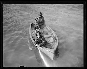 Miniature fireboat Thomas A. Ring used to fight fire under wharves