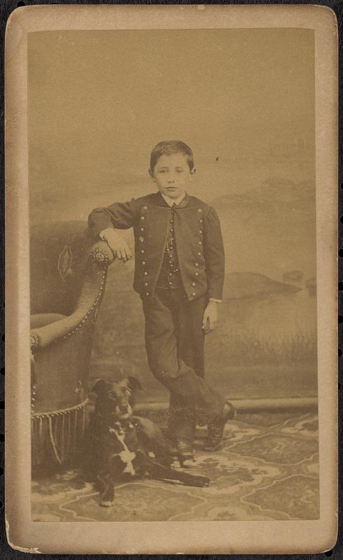 Unidentified boy with dog