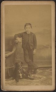 Unidentified boy with dog
