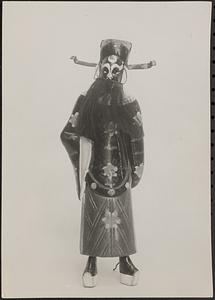 Figurine in ceremonial dress