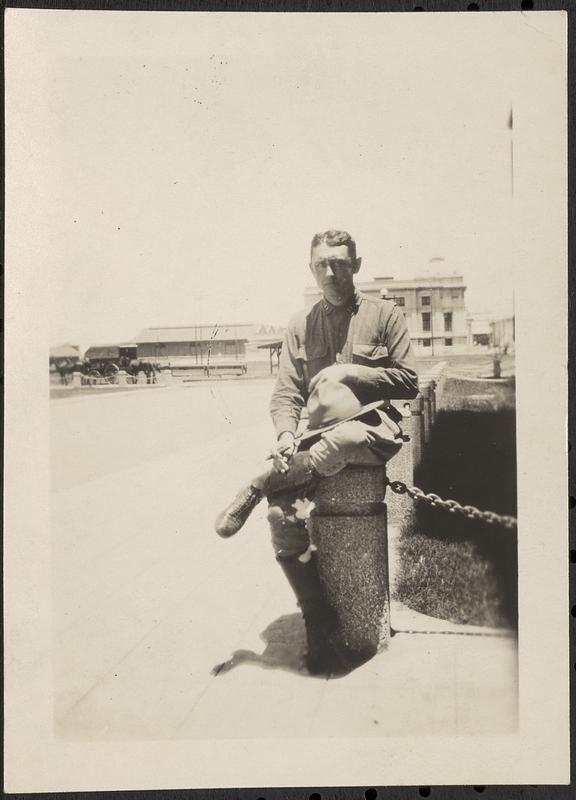 Man in military uniform sitting