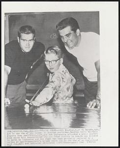 Regains Sight -- Bill Bradley, 9, of El Dorado, Ark., got to see two of his heroes in Houston yesterday. Houston Colts baseball players Joey Amalfitano, left, and Bob Aspromonte attended a press conference where Bill demonstrated his new found ability to see. He was blinded in April by lightning and his sight has been partially restored by a series of operations. Bill' heroes coach him in the use of an improvised pool cue, ball and table.