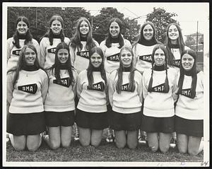 SMA Cheerleaders. Jane Conley, Eileen Sugrue, Marian Gurry, Joni Leverone, Mary Anne McCarthy, Joani Callahan. Rear; Joanne Cirignano, Patti Murphy, Jean O’Neill, Gail McIntyre, Cheryl Murphy, Barbara O’Neill.