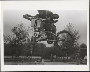 Curtis doing bike tricks