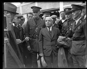 An unidentified group of people, some in military uniform