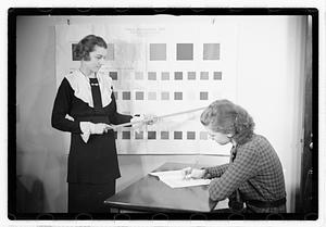 A woman taking a color recognition test