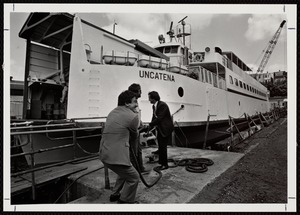 Officials ceremonially "untie" ferry Uncatena from its moorings, following a successful overhaul at Boston Marine Works