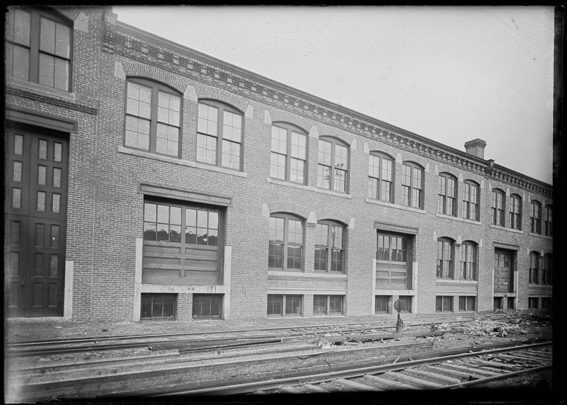 Two story warehouse along railroad spur 1900-1907