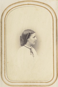 Profile portrait of a woman in a hairnet