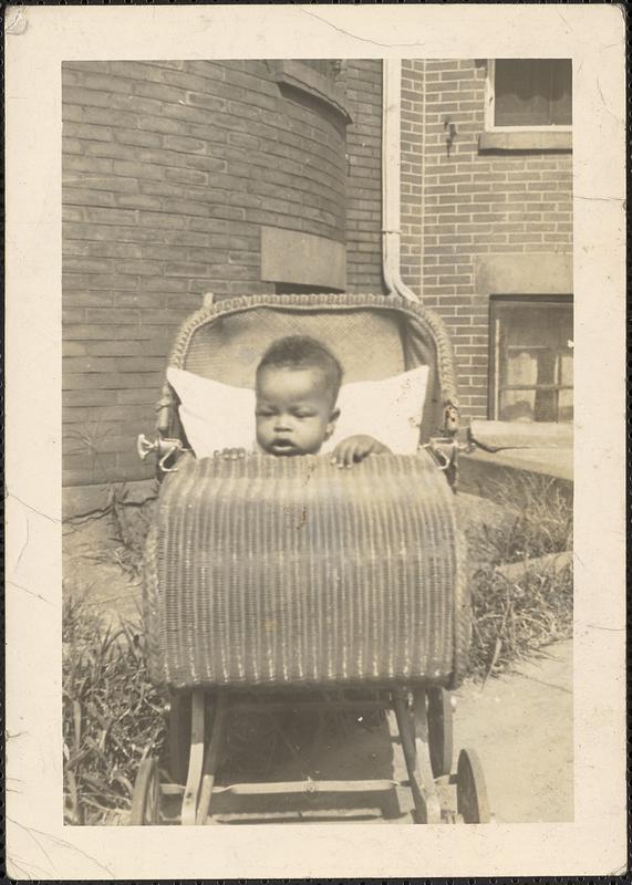 A baby in a stroller