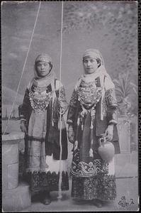 Two women in traditional Greek dress