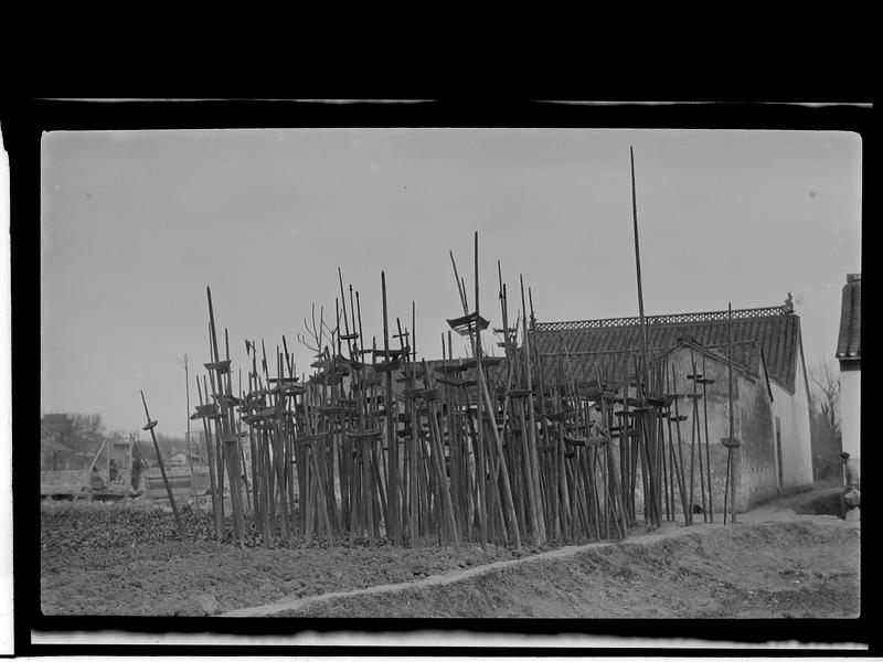 Degree poles outside a family ancestral hall in Nanking