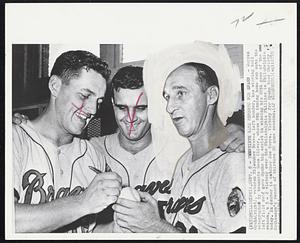Philadelphia – Twentieth Game Memento For Spahn – Warren Spahn (right), veteran Milwaukee Braves left hander, has winning ball autographed by teammate Gene Oliver, whose 8th inning home run onto the left field roof gave Spahn big assist in winning his 20th game of the season, a 3-2 victory over the Philadelphia Phillies in Philadelphia today. In center is catcher Joe Torre. Victory for Spahn tied Christy Mathewson’s record of thirteen 20 game seasons.