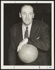 John D. Russell, known all over the baseball world as "Honey" Russell, who will direct the strategy of the Boston Celtics in their crucial playoff game with the Chicago Stags at the Boston Arena tonight.