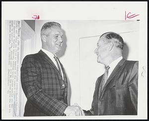 Boston -- Scheffing Congratulates Successor -- Bob Scheffing (left) who today was fired as manager of The Detroit Tigers congratulates his successor Charlie Dressen, veteran major league manager who was named to succeed him. Dressen takes over as the team meets The Red Sox in Boston tonight.