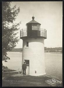 U.S. Whitlock Mill light house 4 mi below Calais, Maine. Capt Frank B. Ingalls in front