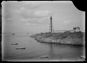 Marblehead light tower and sailboats