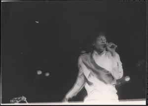 Musician singing with a microphone