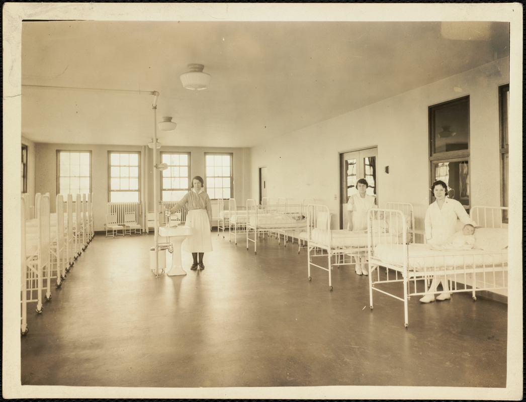 Nurses and infants in hospital ward on Long Island in Boston Harbor