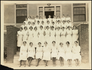 Portrait of nurses standing in front of building on Long Island in Boston Harbor