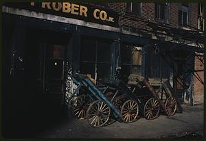 Wheelbarrows in front of Prober Co., Inc., South Market Street, Boston