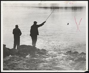 Two people fishing
