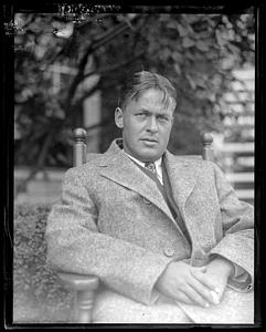 Unidentified seated man