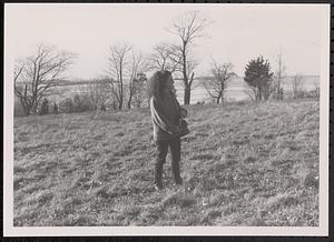 Woman standing in a field