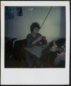 Susan Richards sitting at a table