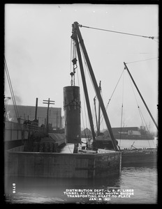 Distribution Department, Low Service Pipe Lines, tunnel at Chelsea North Bridge, transporting shaft to place, Mystic River; Charlestown; Chelsea, Mass., Jan. 8, 1901