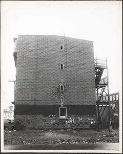 Side view of shingle-sided building, Boston