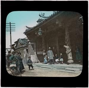 People in front of a temple