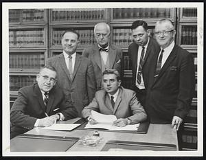 Jail Break Probe to be launched Monday by Boston Finance Commission. Group will tour Charles Street Jail tomorrow and view the latest escape route. Seated, left to right: Chandler W. Smith, acting executive secretary; George Berkley, chairman. Standing: Dr. Roger J. Abizaid, Russell S. Codman, Jr., Atty Charles J. Elmore, special counsel for probe; Joseph P. McNamara.