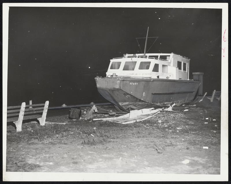 A Close View of boats is possible for people who like to sit on the benches in South Boston and watch the pleasure craft in the bay. This boat was tossed onto one of the benches near the South Boston Yacht Club by yesterday's hurricane.