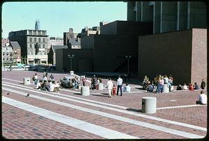 A crowd of people on Boston City Hall plaza