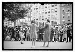 Two young women competing, Boston Common