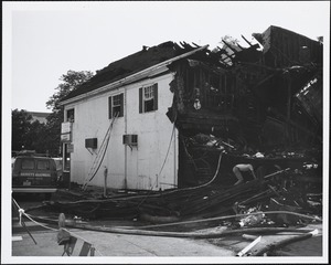 Rear of Harvey's Hardware - morning after big fire of May 22, 1977
