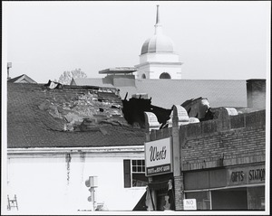 Detail of fire-damaged roof of Harvey's Hardware, at corner of Chestnut and Great Plain Avenue