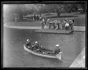 Sailors rowing, possibly in the Boston Public Garden