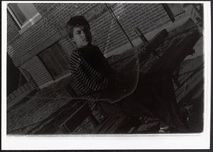 Val sitting on a bench
