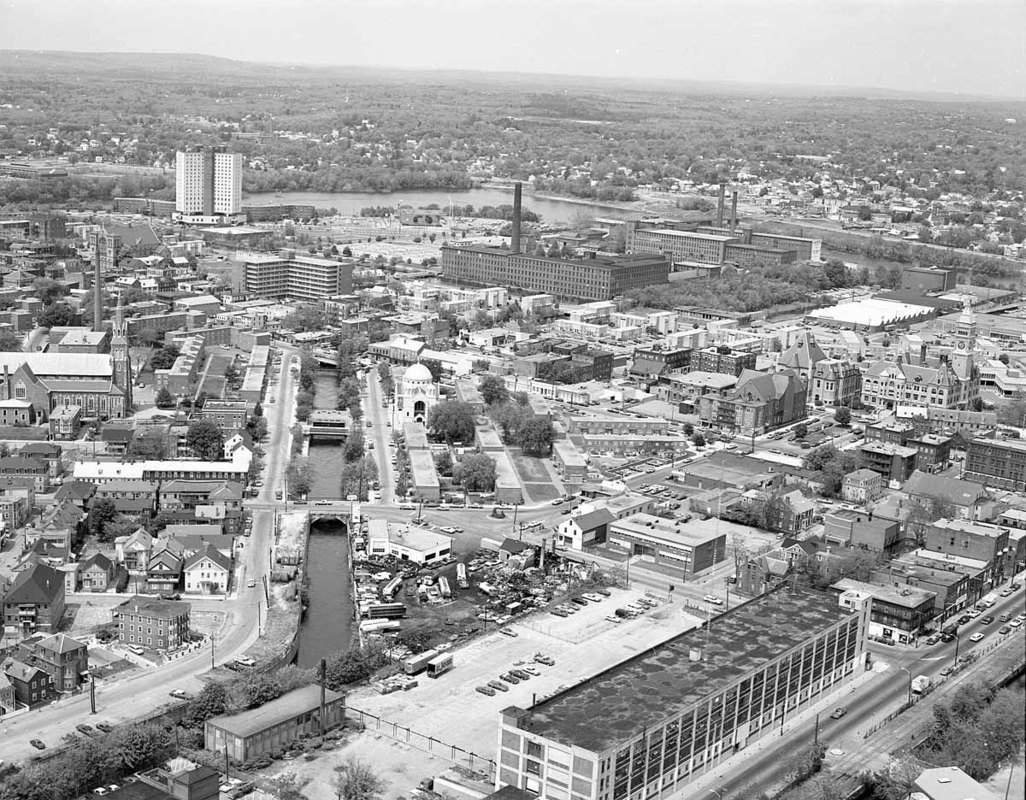 Looking northeast along Merrimack Canal from Joan Fabrics to big view of Lowell