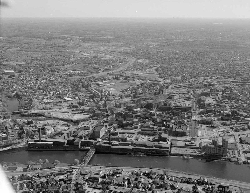 Looking south over Merrimack River and Downtown at Bridge St. bridge