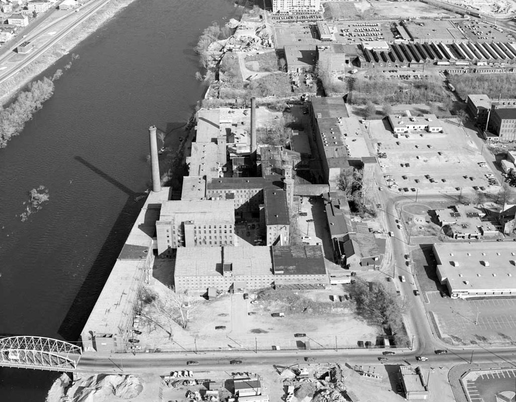 Close up of Lawrence Mills with Merrimack River on left