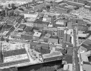 Downtown looking from Leo Roy Garage construction to high school and Boott Mill parking