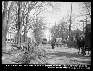 Distribution Department, Northern High Service Pipe Lines, Section 33, Broadway at High Street, relaying 15-inch surface water drain to provide for 24-inch main, Everett, Mass., Dec. 11, 1909